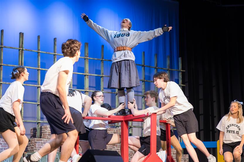 Students perform onstage